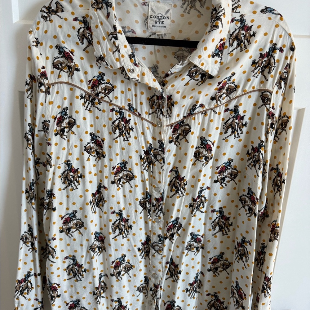 Cotton Eye Women's western pearl snap blouse.